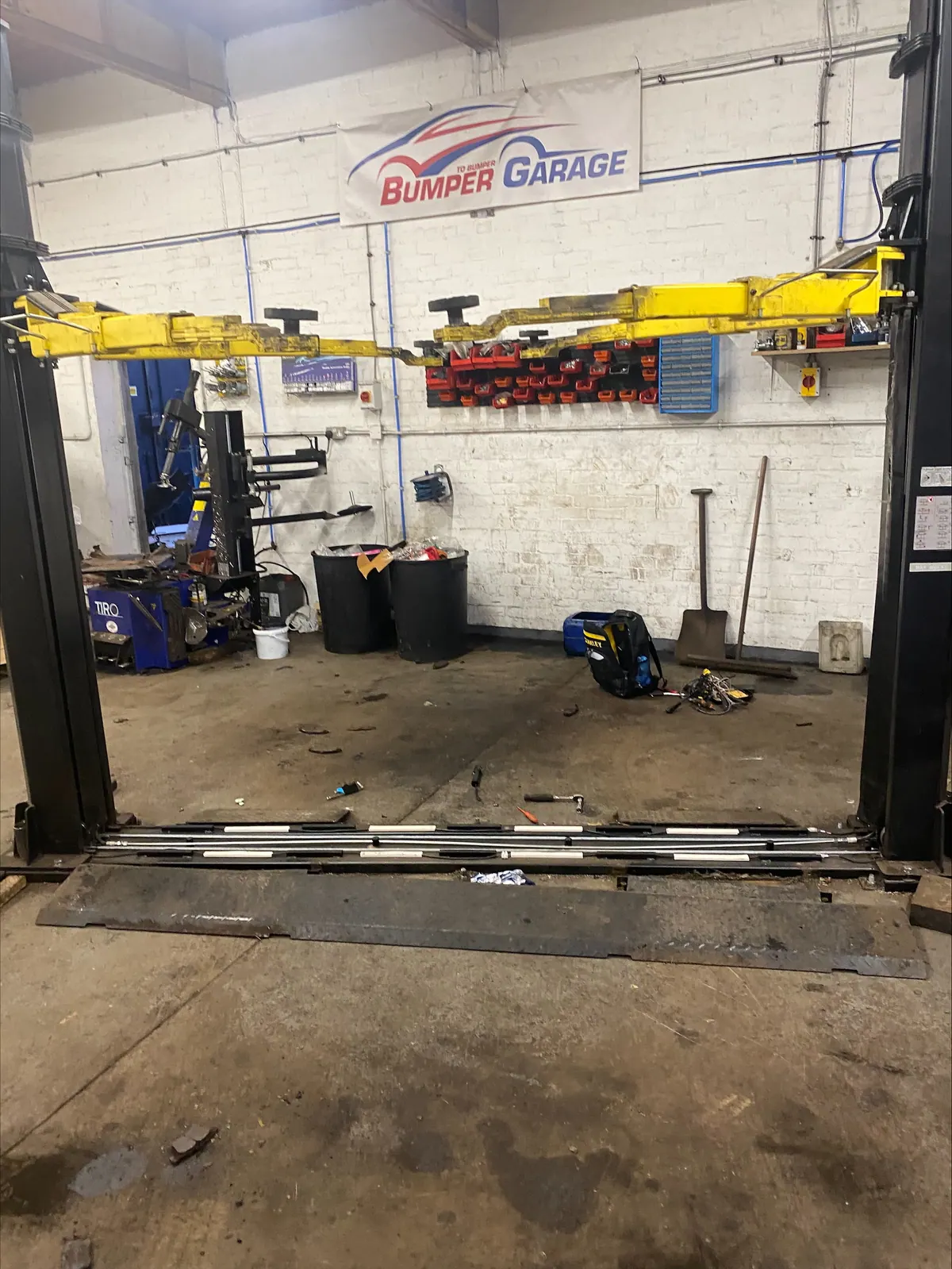 Vehicle lift garage examination for LOLER compliance